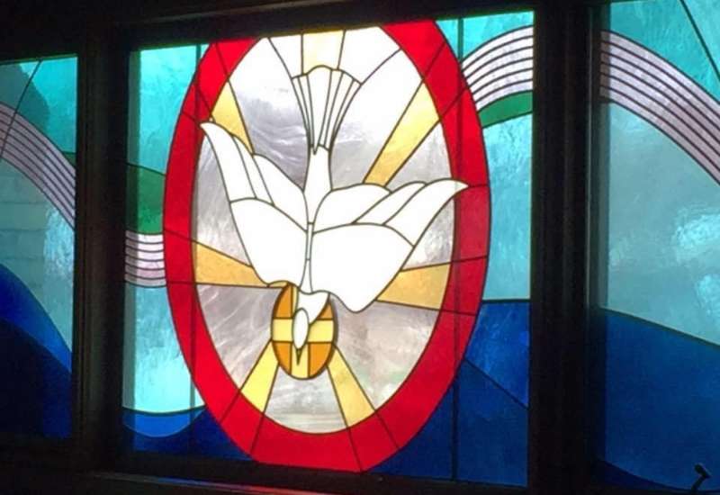 A stained glass dove