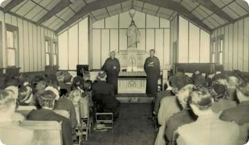 An old photo of the interior of church building